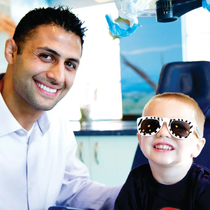 Pediatric dentist careers with D4C allow for fulfilling patient relationships, like Dr. Eric has with his smiling patients.